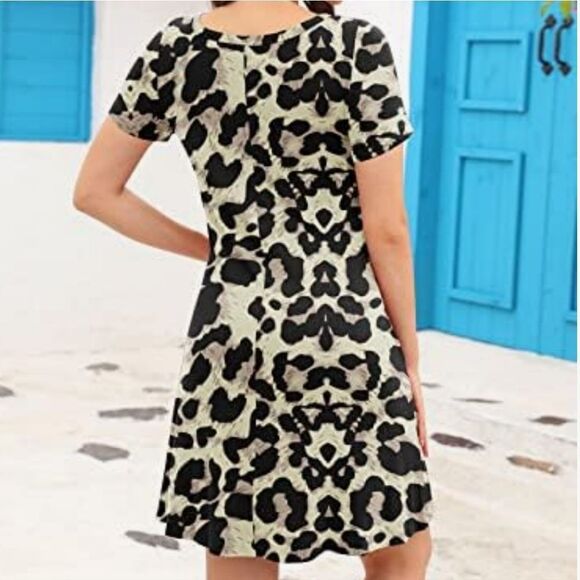 Korsis Animal Print Round Neck Swing Short Sleeve Jersey Dress - Picture 4 of 16